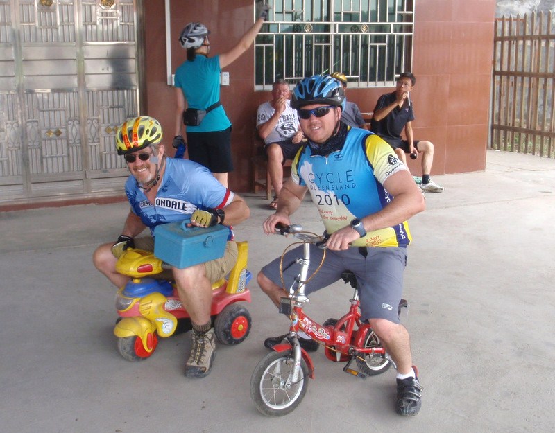 Dennis and Mark participate in the Great Bike Race.